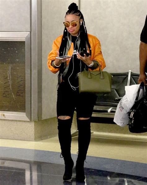 Blac Chyna Dresses Like a Rock Star in Orange Jacket and 